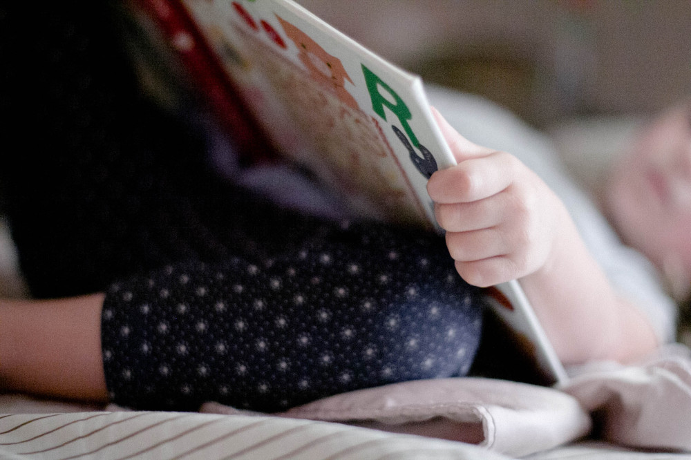 Public Domain- Little Girl Reading Book Bedtime Nap
